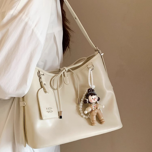 Túi Xách Nữ Da Dây Cột Nơ Phối Charm