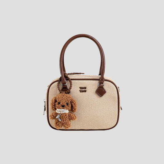 Túi Xách Nữ Hộp Canvas Viền Da Phối Charm Gấu