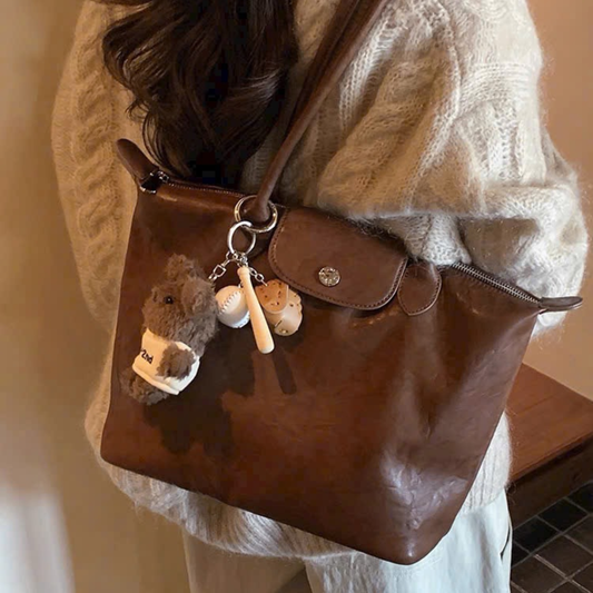 Túi Xách Nữ Da Nắp Gập Cúc Bấm Phối Charm Gấu