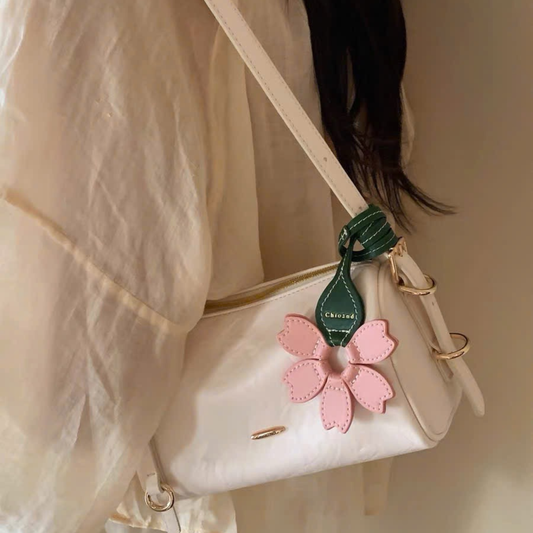 Túi Xách Nữ Dáng Trống Phối Charm Hoa