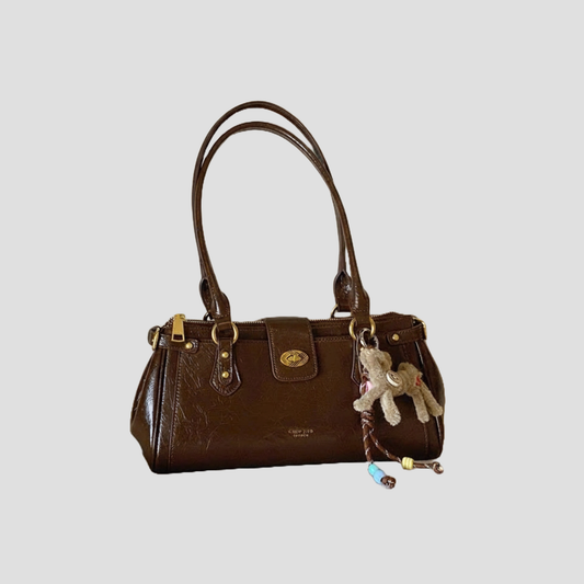 Túi Xách Nữ Hộp Khoá Gập Xoay Phối Charm Gấu