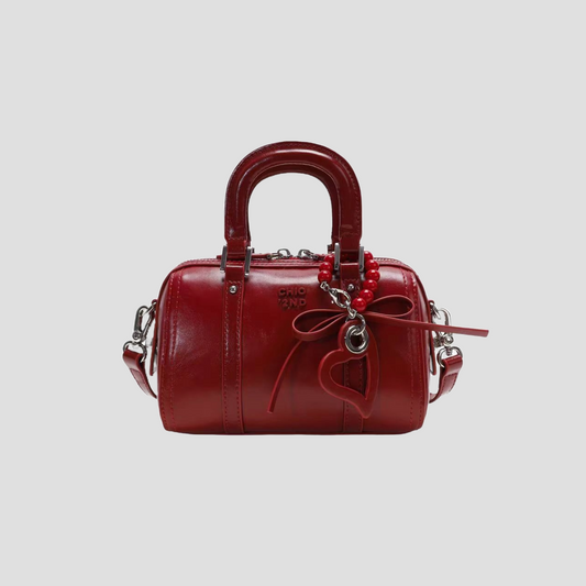 Túi Xách Nữ Kiểu Trống Phối Charm Trái Tim